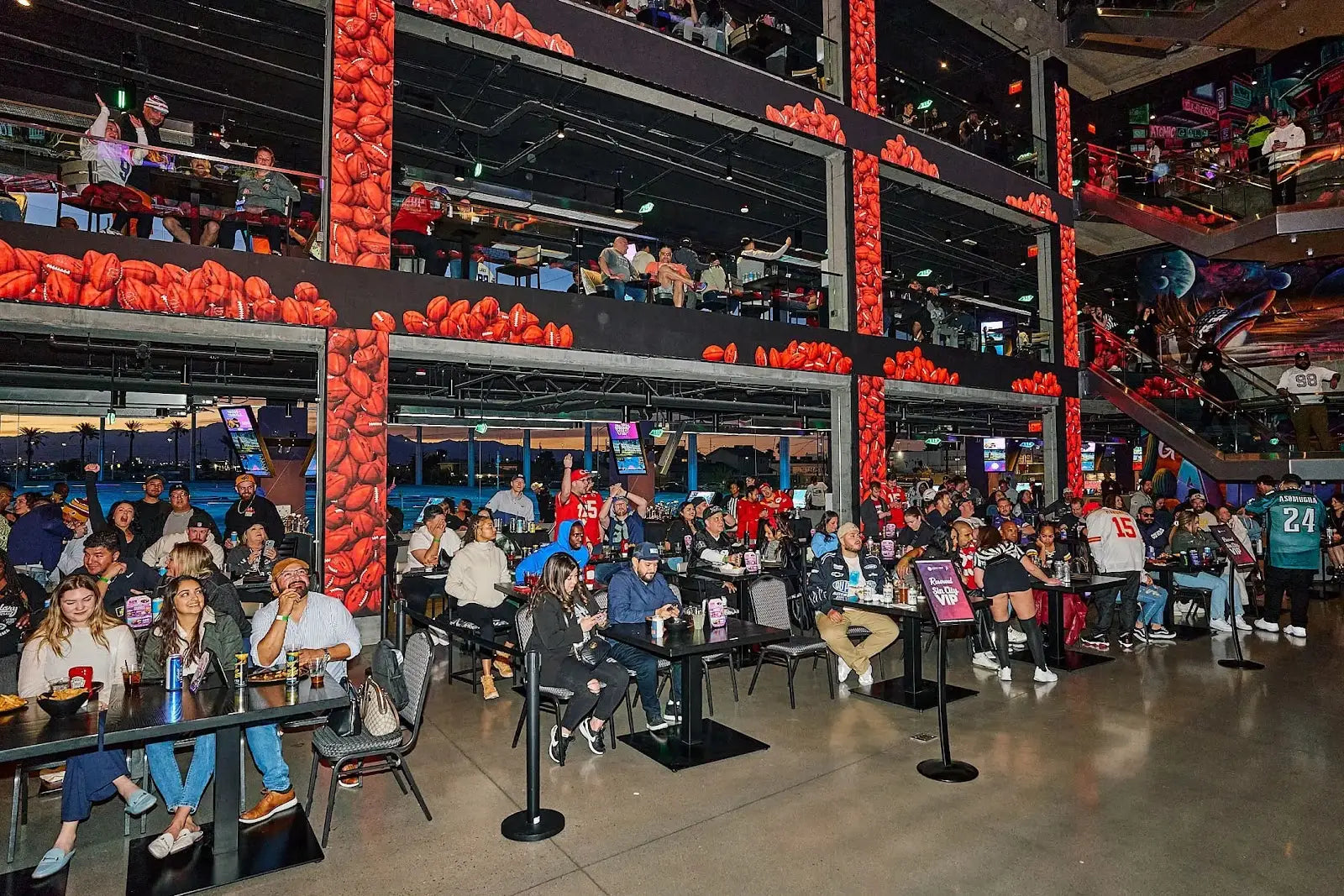 Massive 57-foot HD video wall at Atomic Golf for the ultimate baseball game viewing experience