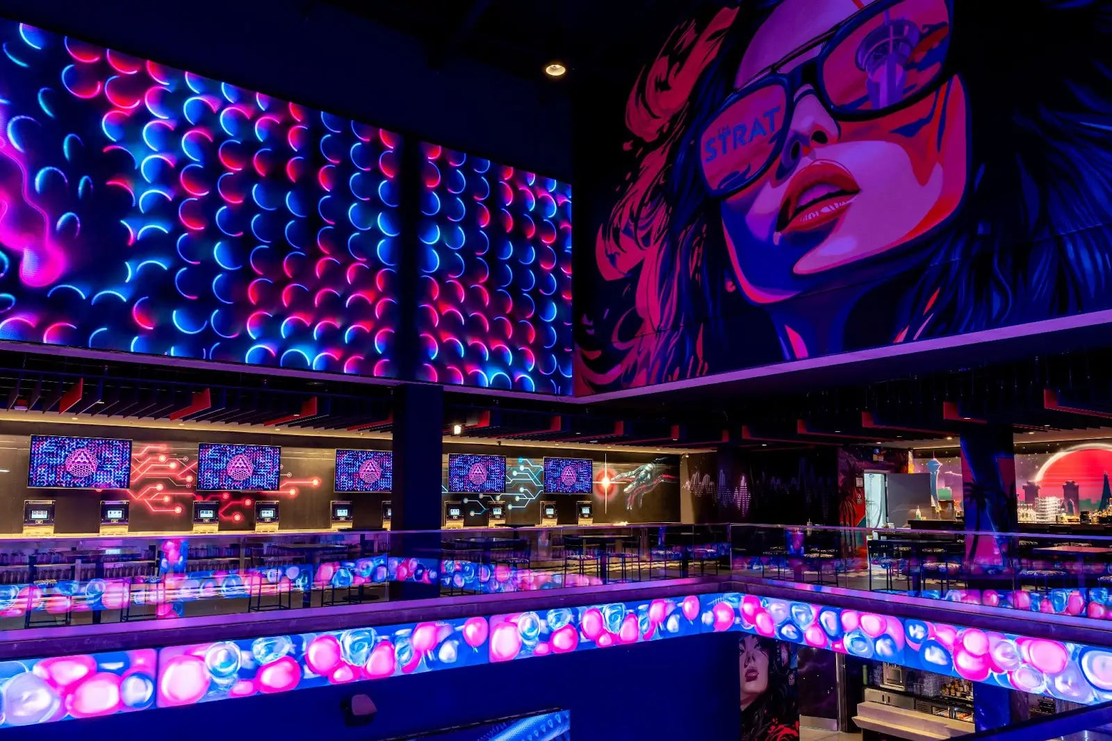 Massive 57-foot HD screens and gourmet food at Atomic Golf Las Vegas for the ultimate game-day experience
