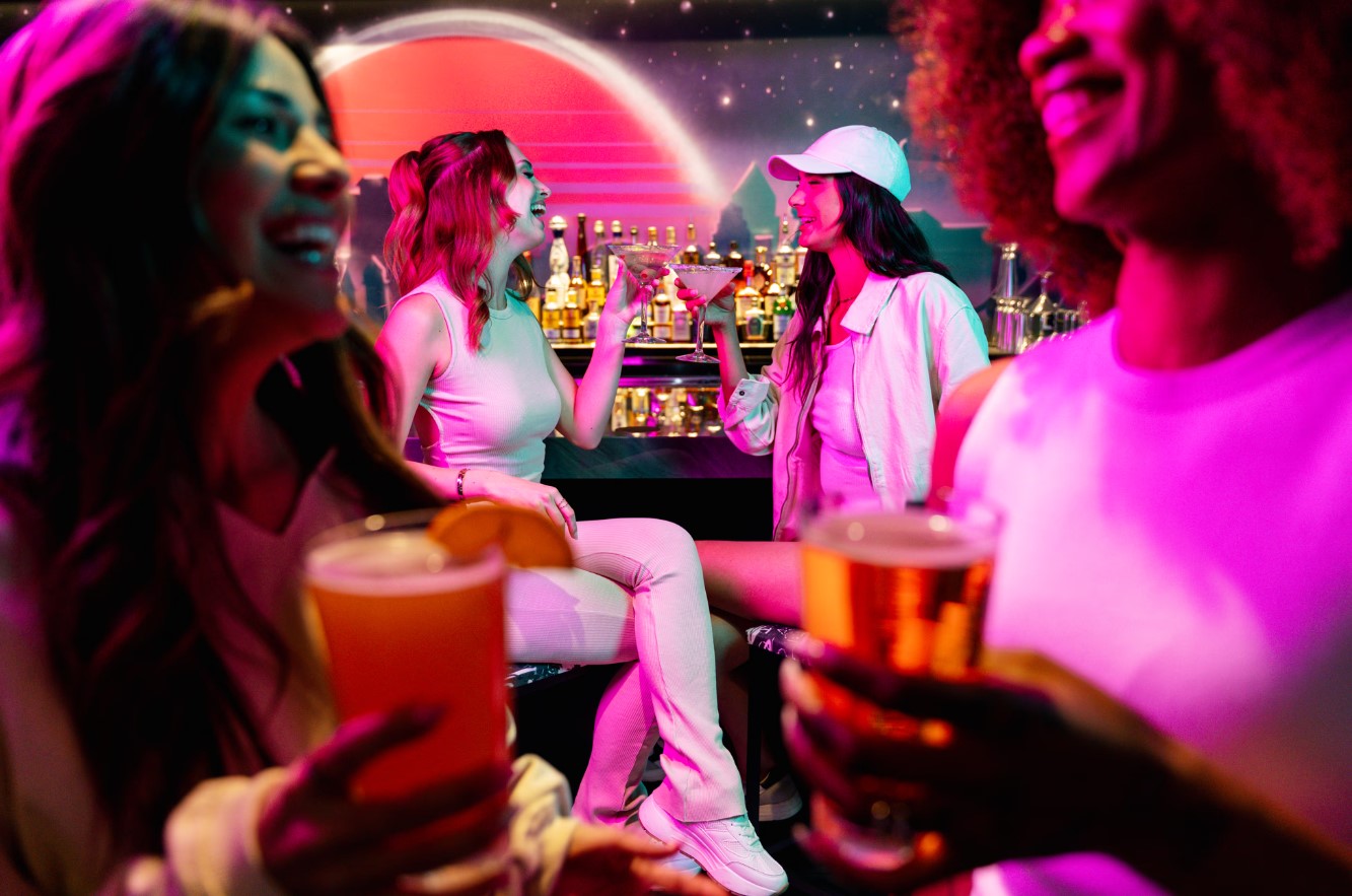 A vibrant event in Las Vegas with a packed crowd