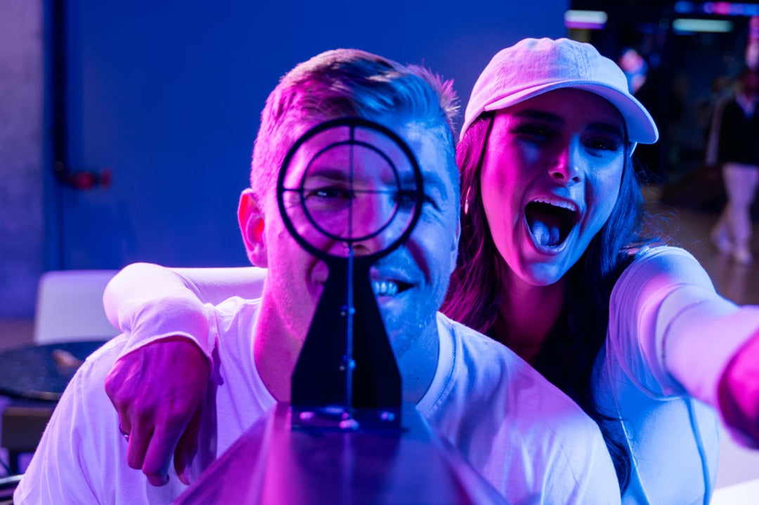 A group enjoying mini golf, great food, and vibrant nightlife at Atomic Golf Las Vegas.