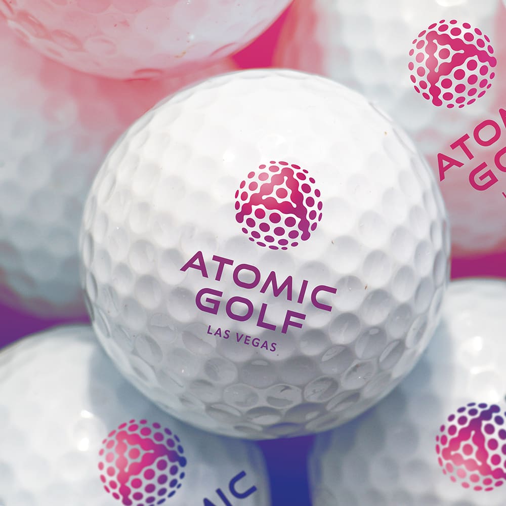 Atomic Golf logo on golf balls
